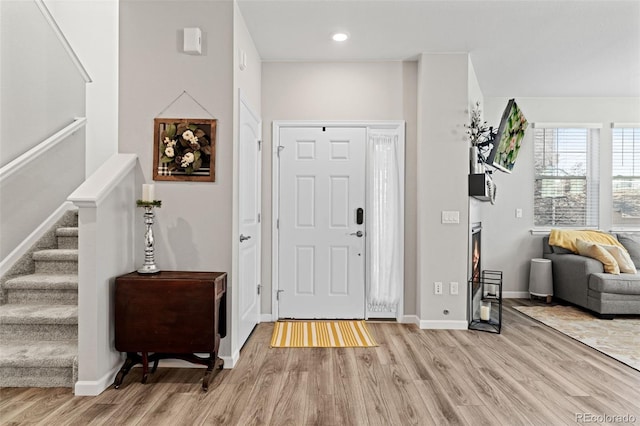 entrance foyer featuring light hardwood / wood-style floors