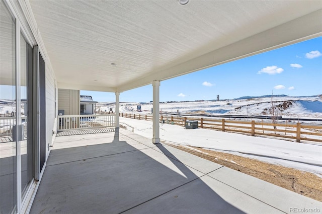 view of snow covered patio