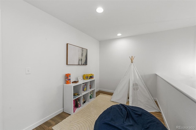 1337 N Alton St, Aurora, CO 80010 - playroom with wood finished floors, baseboards, and recessed lighting