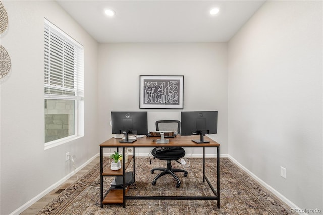 office space featuring hardwood / wood-style floors