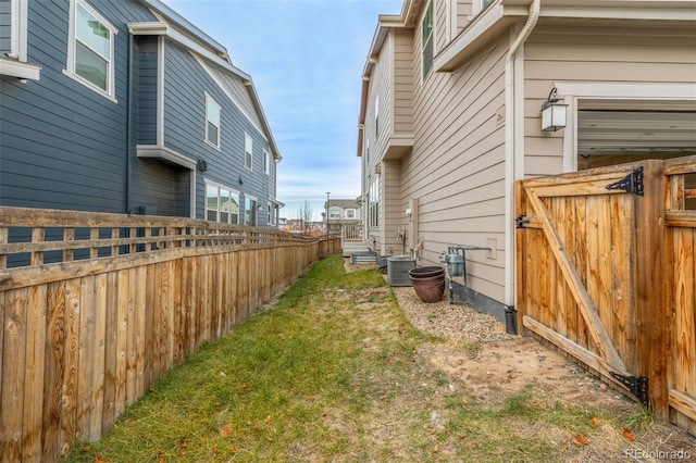 view of yard featuring central AC unit