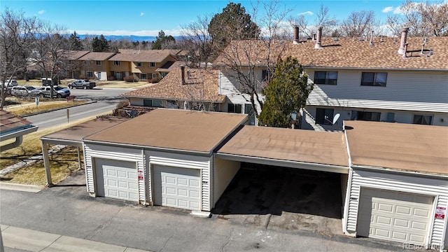 view of front of home featuring a garage and a residential view