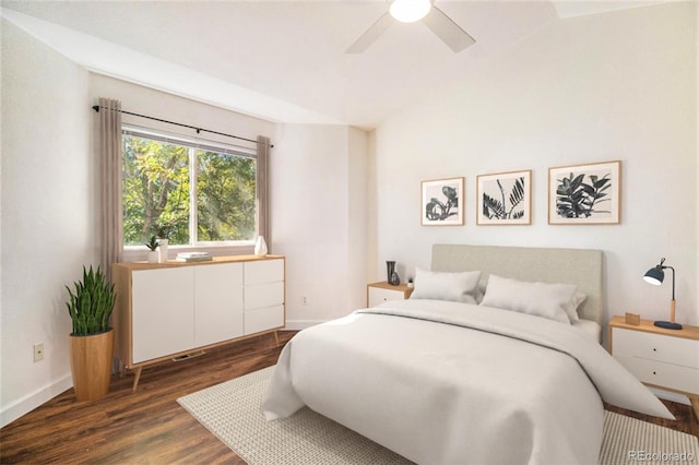 bedroom with dark hardwood / wood-style floors and ceiling fan