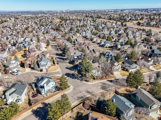 birds eye view of property with a residential view