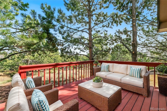 wooden deck featuring outdoor lounge area