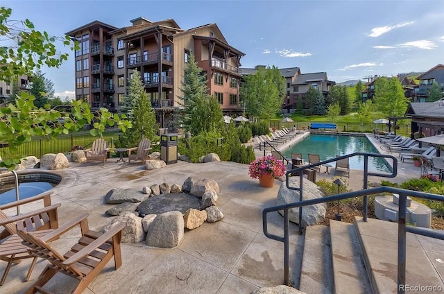 view of pool featuring a patio area