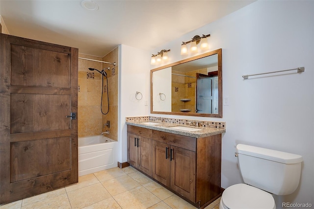 full bathroom with tiled shower / bath, vanity, toilet, and tile patterned flooring