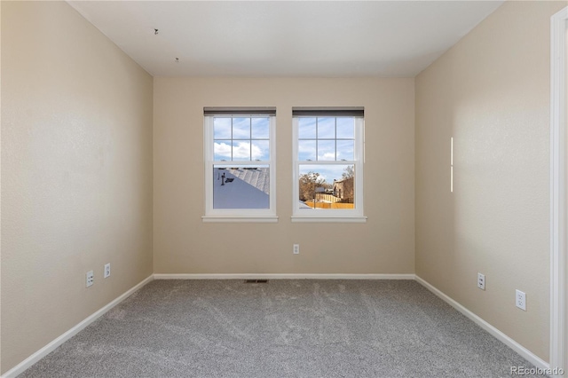 empty room featuring carpet