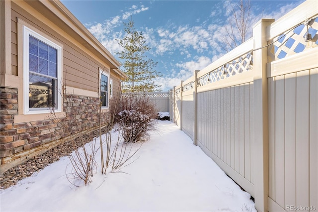 view of snowy yard