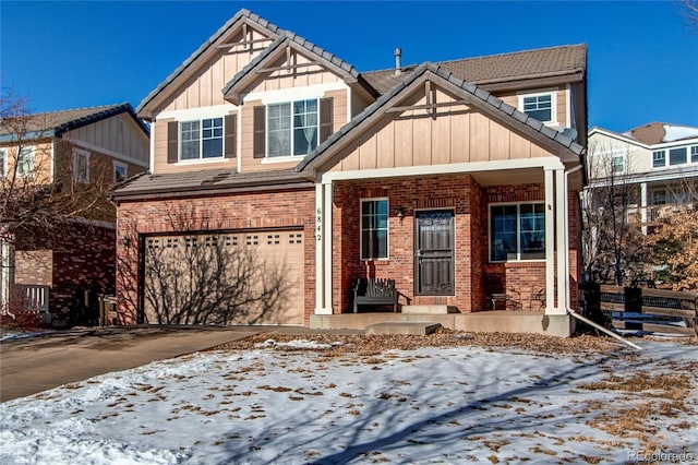 craftsman house with a garage