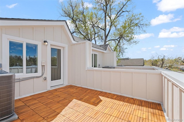 wooden deck featuring central AC