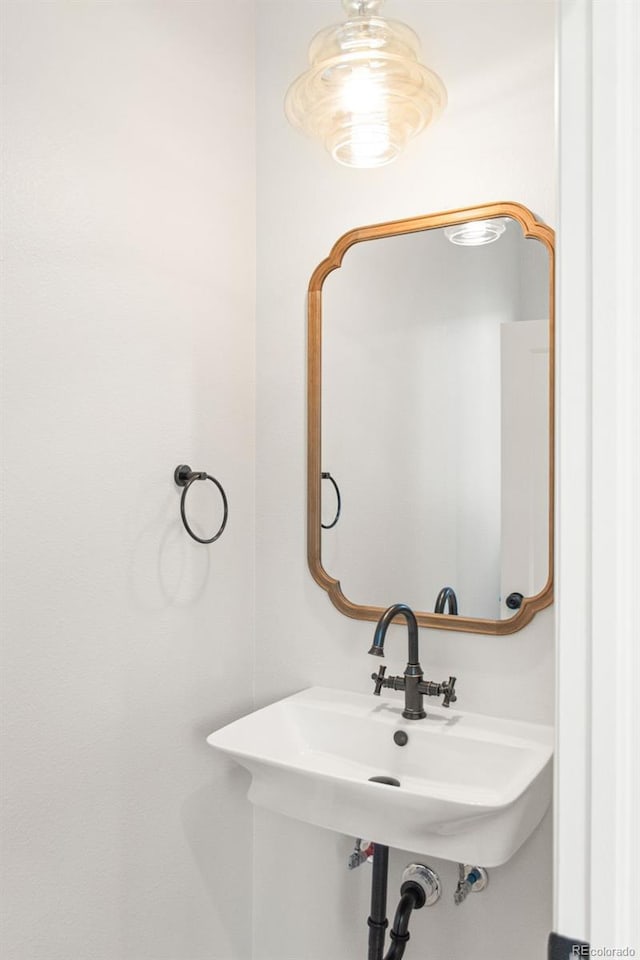 1052 N Knox Ct, Denver, CO 80204 - bathroom featuring a sink