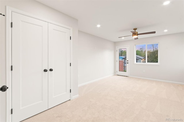 1052 N Knox Ct, Denver, CO 80204 - unfurnished bedroom featuring light carpet, recessed lighting, access to outside, baseboards, and ceiling fan