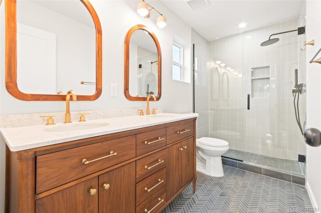 1052 N Knox Ct, Denver, CO 80204 - full bath with double vanity, a shower stall, toilet, and tile patterned flooring