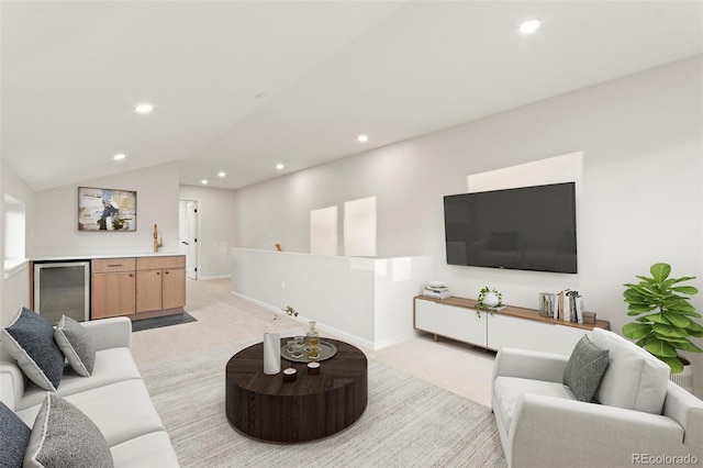 1052 N Knox Ct, Denver, CO 80204 - living area featuring beverage cooler, light colored carpet, recessed lighting, vaulted ceiling, and bar area