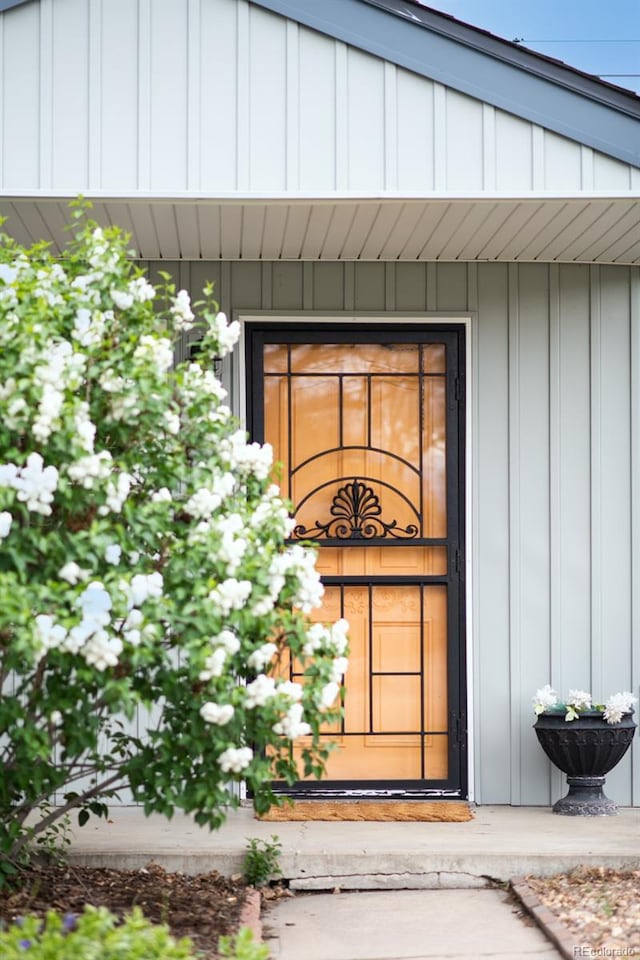 3202 S Dahlia St, Denver, CO 80222 - entrance to property featuring board and batten siding