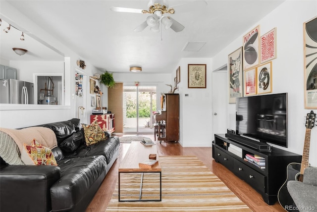 3202 S Dahlia St, Denver, CO 80222 - living room with light wood finished floors and a ceiling fan