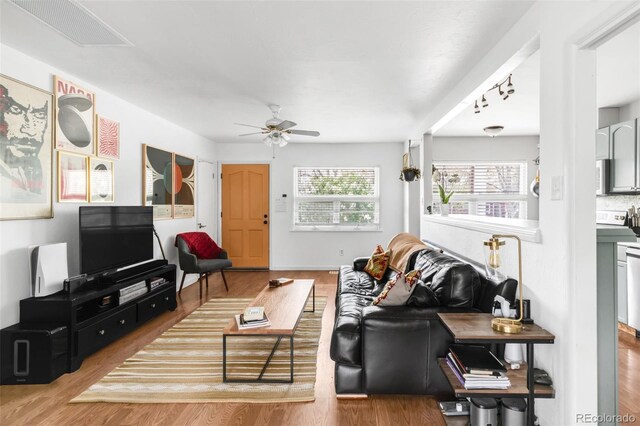 3202 S Dahlia St, Denver, CO 80222 - living area featuring a ceiling fan and wood finished floors