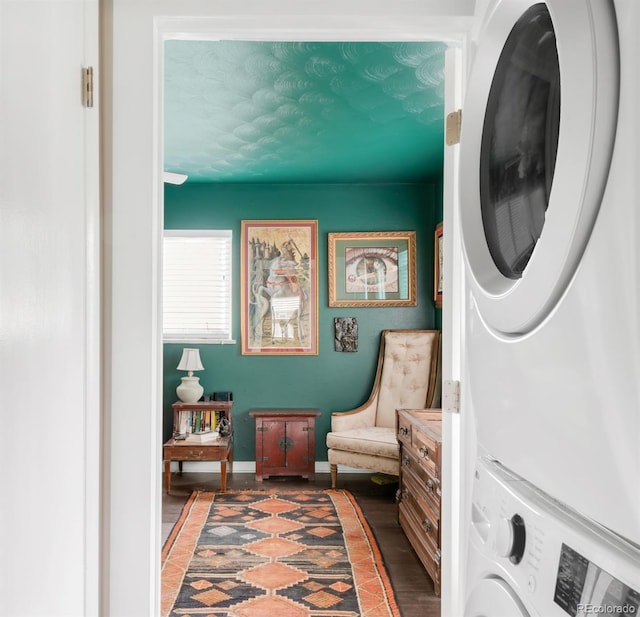 3202 S Dahlia St, Denver, CO 80222 - clothes washing area with estacked washer and dryer, baseboards, and light wood finished floors