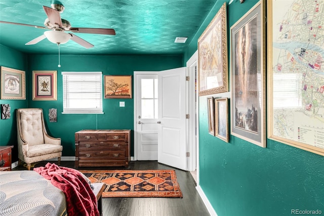 3202 S Dahlia St, Denver, CO 80222 - bedroom featuring baseboards, dark wood-style floors, and ceiling fan