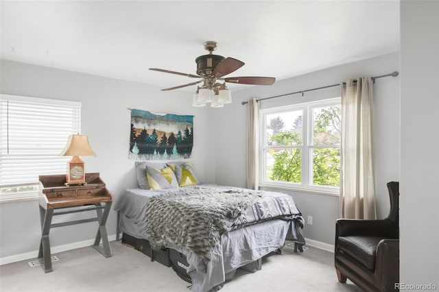 3202 S Dahlia St, Denver, CO 80222 - carpeted bedroom with baseboards and a ceiling fan