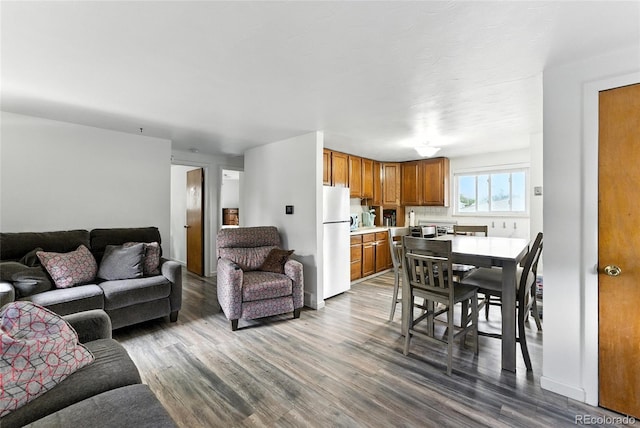 4505 W Gill Pl, Denver, CO 80219 - living area featuring dark wood-style floors
