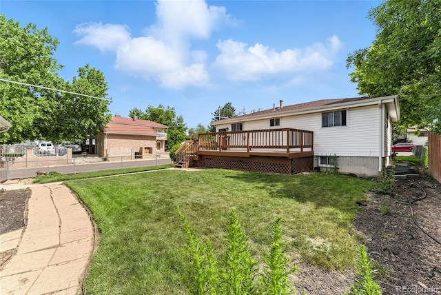 4505 W Gill Pl, Denver, CO 80219 - view of yard with a wooden deck