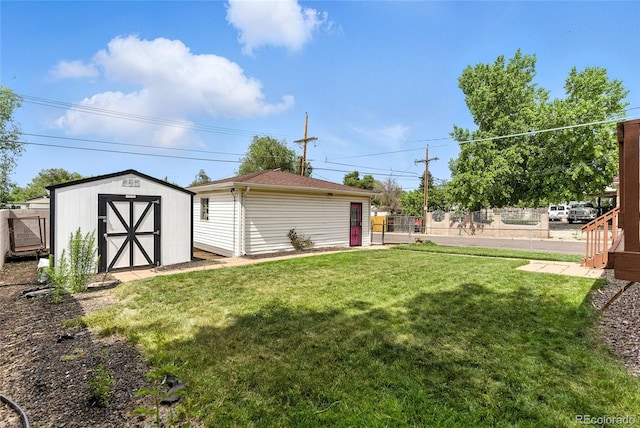 4505 W Gill Pl, Denver, CO 80219 - view of yard featuring a storage unit