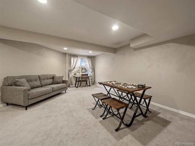 dining room featuring light colored carpet