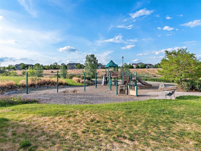 view of play area with a yard