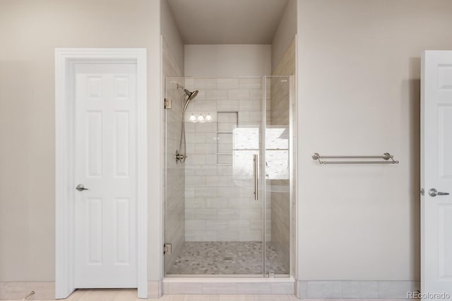 bathroom featuring a stall shower