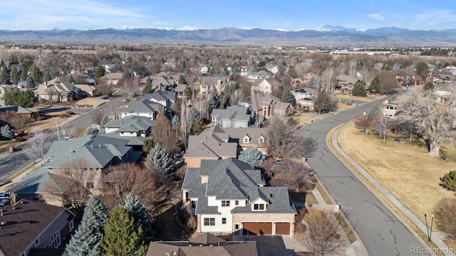 drone / aerial view with a mountain view and a residential view