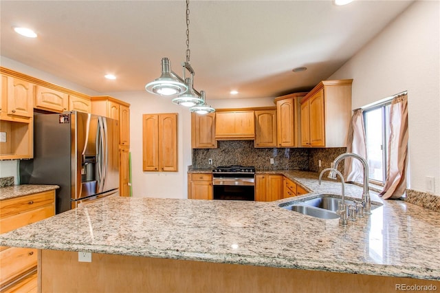 16291 E 7th Dr, Aurora, CO 80011 - kitchen featuring appliances with stainless steel finishes, a sink, light stone countertops, backsplash, and a peninsula