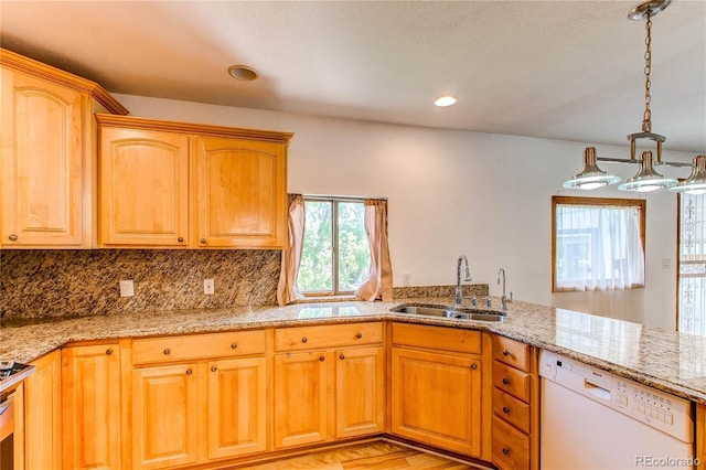 16291 E 7th Dr, Aurora, CO 80011 - kitchen with white dishwasher, a sink, light stone countertops, decorative light fixtures, and recessed lighting