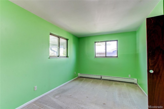 16291 E 7th Dr, Aurora, CO 80011 - carpeted spare room featuring baseboard heating and baseboards