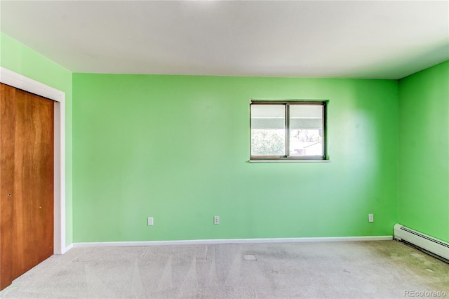16291 E 7th Dr, Aurora, CO 80011 - spare room with baseboard heating, baseboards, and carpet floors