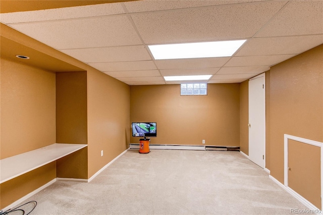 16291 E 7th Dr, Aurora, CO 80011 - below grade area featuring a drop ceiling, carpet floors, baseboards, and baseboard heating
