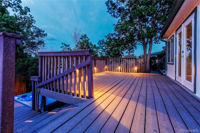 16291 E 7th Dr, Aurora, CO 80011 - deck at dusk featuring a fenced backyard