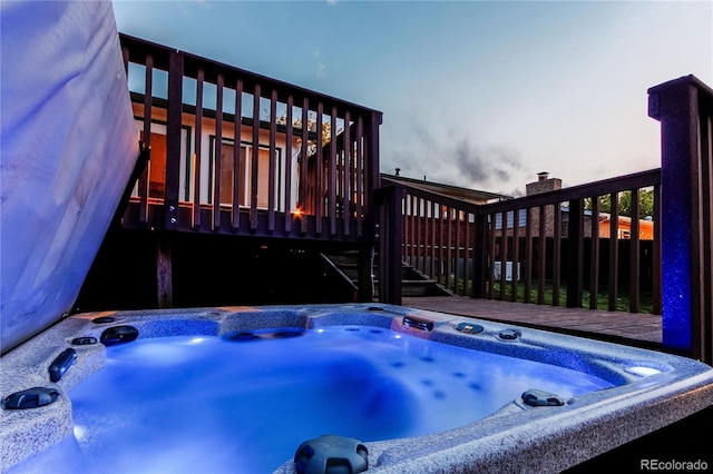 16291 E 7th Dr, Aurora, CO 80011 - wooden terrace featuring a covered hot tub and stairway