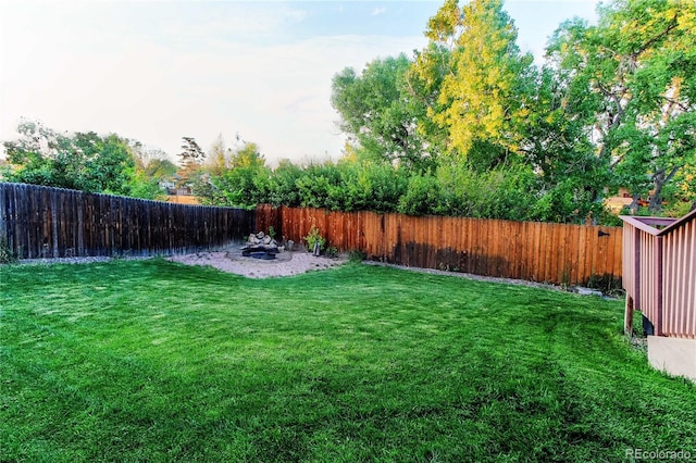 16291 E 7th Dr, Aurora, CO 80011 - view of yard featuring a fire pit