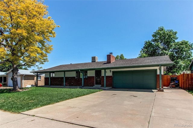 16291 E 7th Dr, Aurora, CO 80011 - single story home with concrete driveway, brick siding, an attached garage, a chimney, and cooling unit