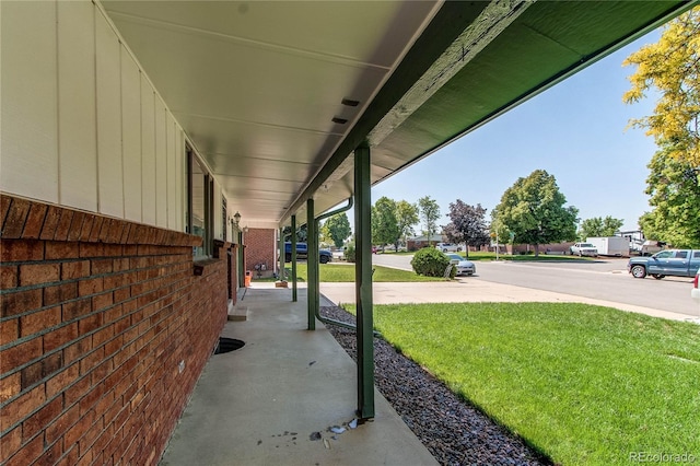16291 E 7th Dr, Aurora, CO 80011 - porch with a lawn