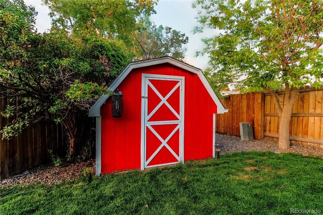 16291 E 7th Dr, Aurora, CO 80011 - view of shed featuring a fenced backyard