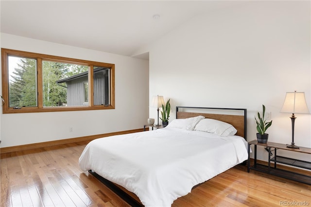 bedroom with light wood-type flooring