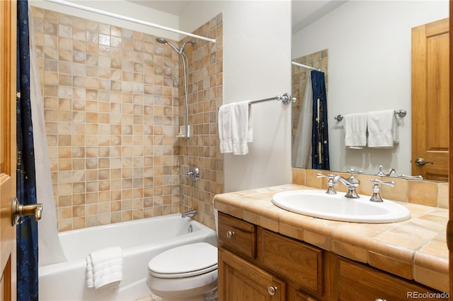 full bathroom with toilet, shower / tub combo, and vanity