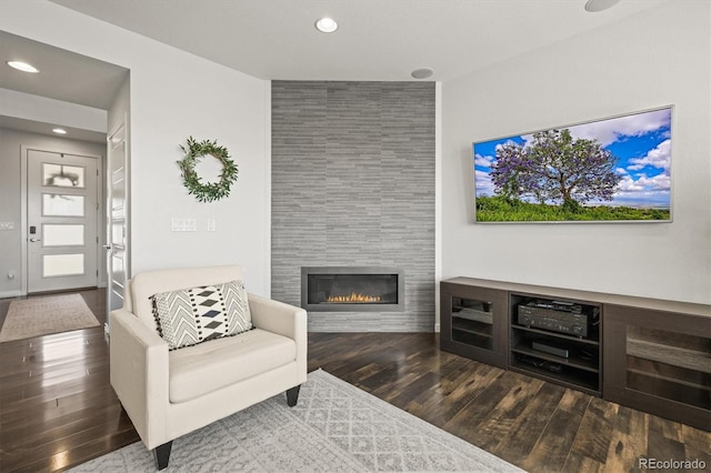 11046 Pastel Pt, Parker, CO 80134 - living area featuring wood finished floors, a fireplace, and recessed lighting