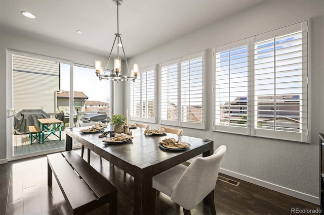 11046 Pastel Pt, Parker, CO 80134 - dining space featuring healthy amount of natural light, baseboards, wood finished floors, recessed lighting, and a textured wall