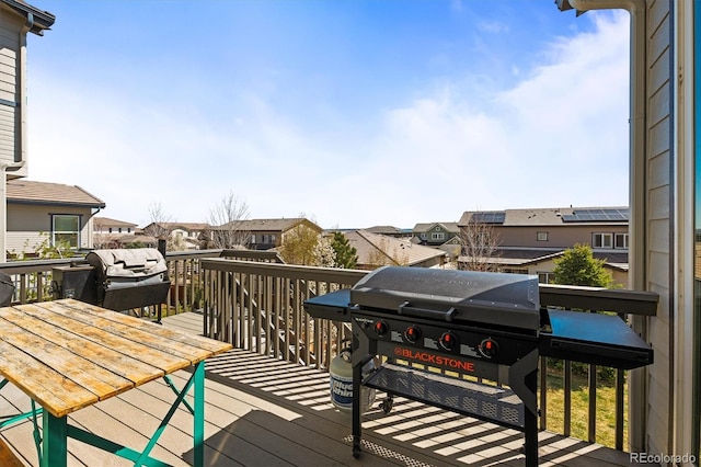 11046 Pastel Pt, Parker, CO 80134 - wooden terrace with a residential view and grilling area