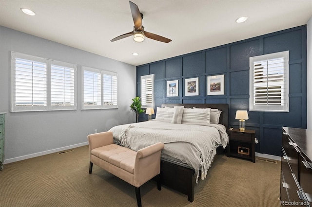 11046 Pastel Pt, Parker, CO 80134 - carpeted bedroom with a decorative wall, recessed lighting, baseboards, and ceiling fan