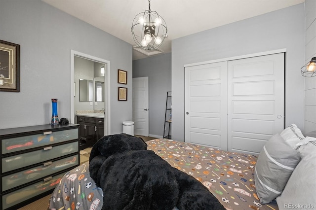 11046 Pastel Pt, Parker, CO 80134 - bedroom with a closet, a sink, ensuite bath, a chandelier, and baseboards